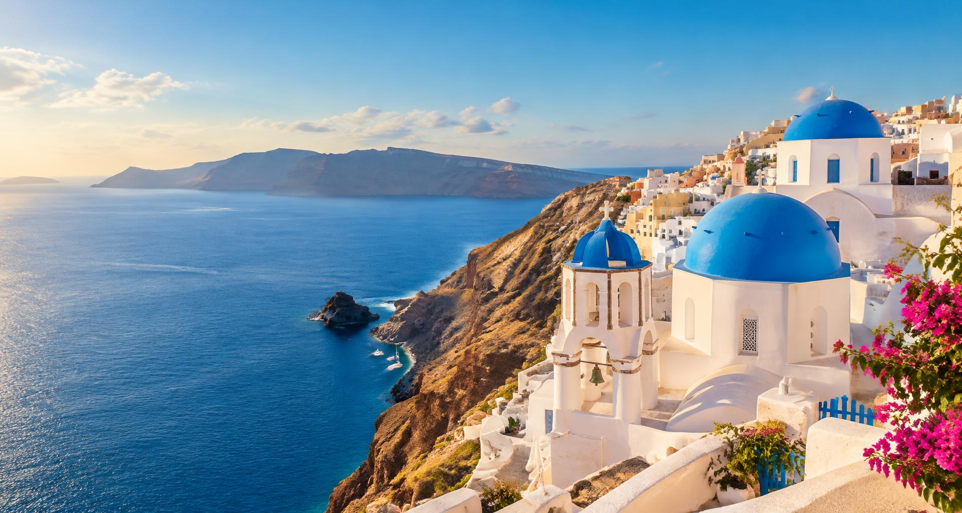 Blue-domed churches overlooking the Aegean Sea in Santorini